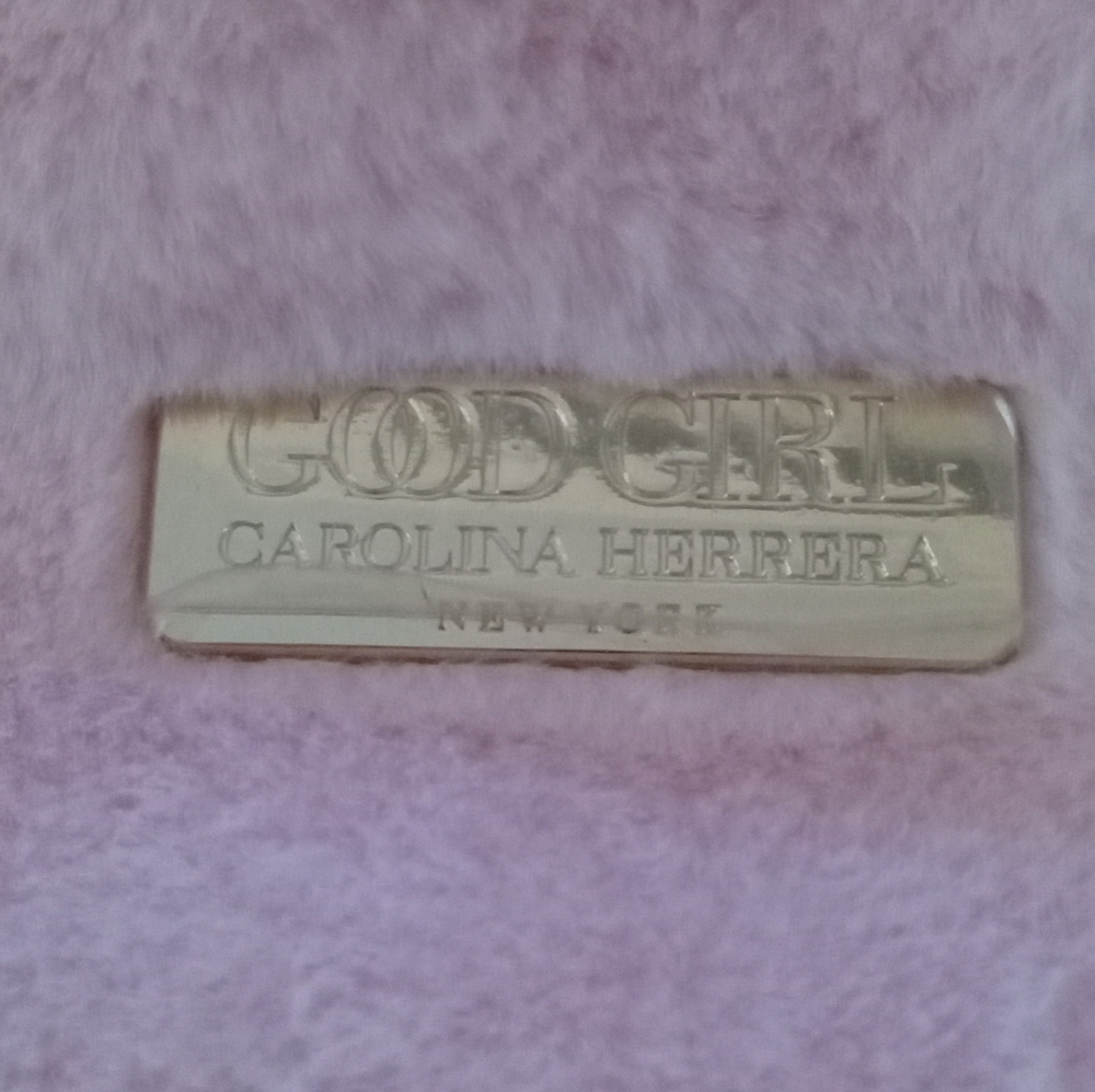 Carolina Herrera Makeup/Parfum purse